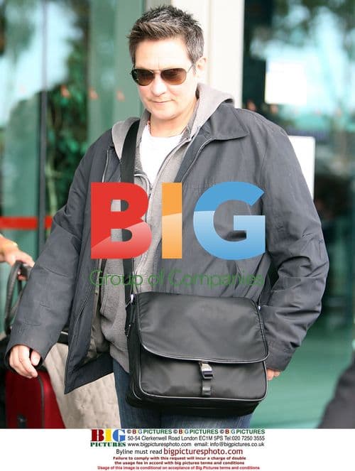 KD Lang arrives at Perth Airport