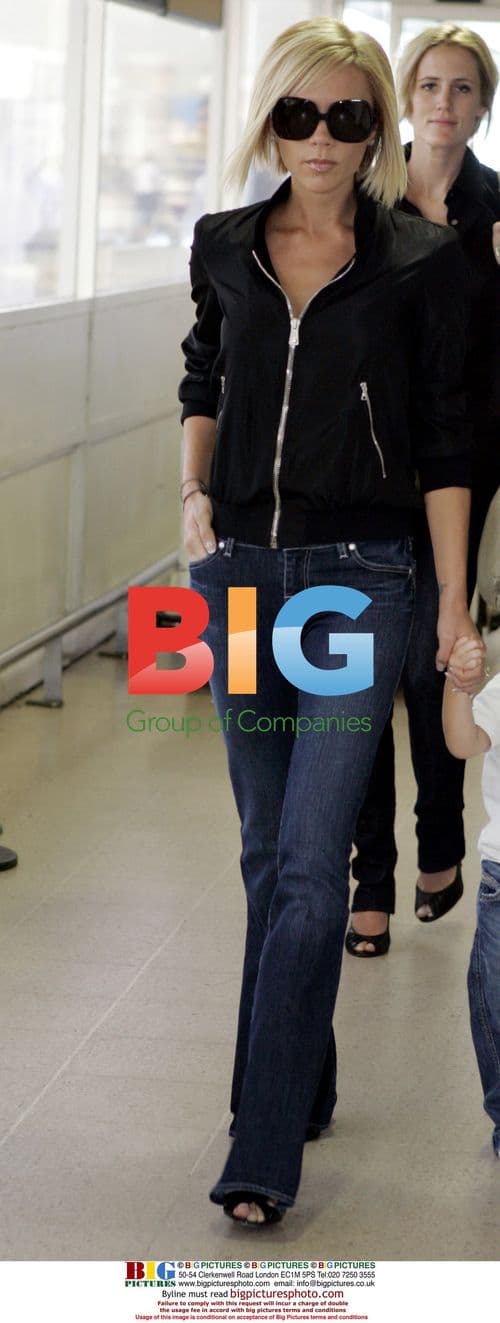 Victoria Beckham and son Cruz at Heathrow