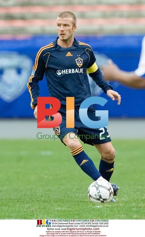 David Beckham chases ball in exhibition match