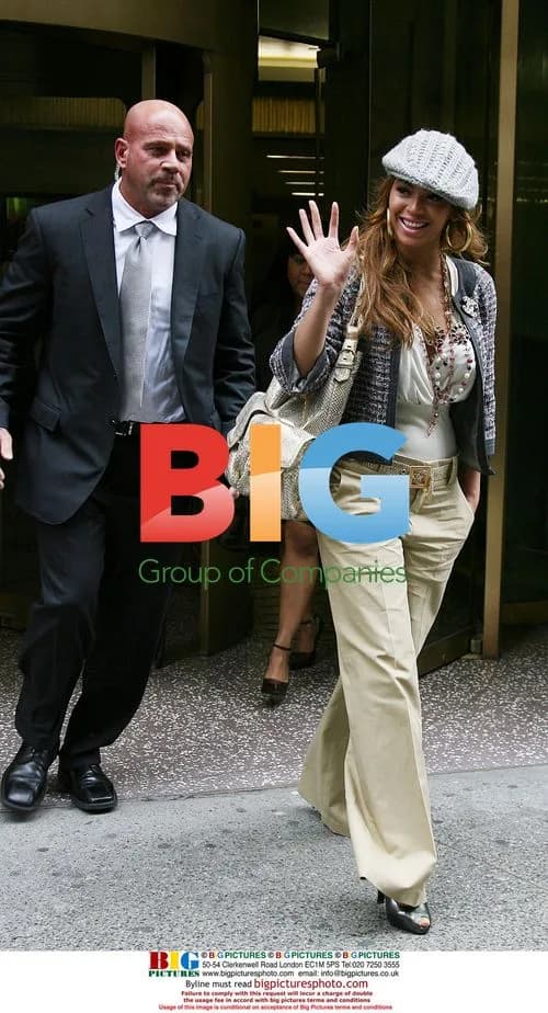 Beyonce Knowles Waves to Fans