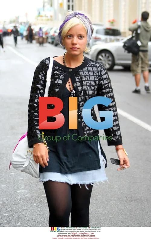 Lily Allen strolling in Cannes during rain