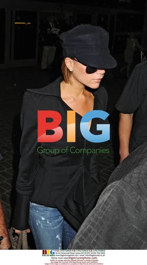 Victoria Beckham Arrives at LAX with Family