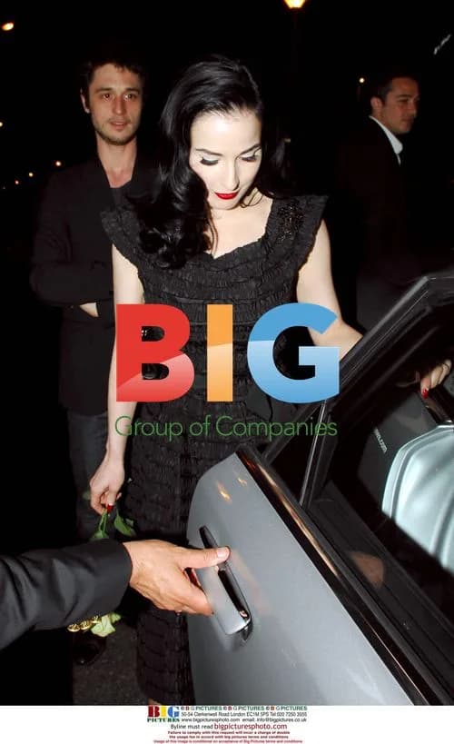 Dita Von Teese Leaving Hotel with Mystery Man