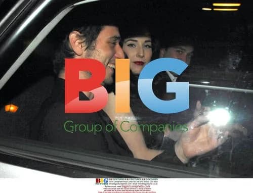 Dita Von Teese Leaves Hotel with Mystery Man