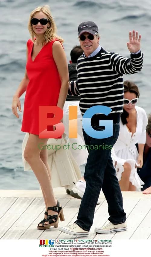 Tommy Hilfiger and girlfriend at Eden Roc Hotel