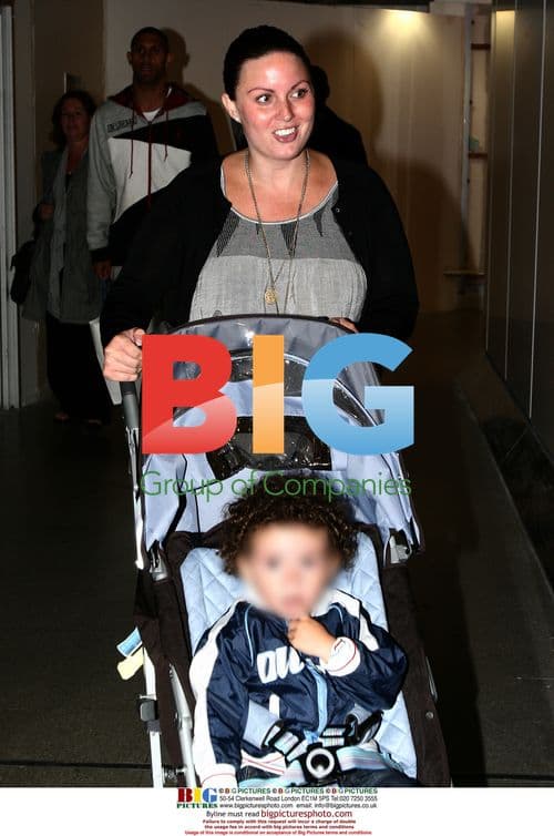 Coleen McLoughlin with other WAGs at Manchester Airport