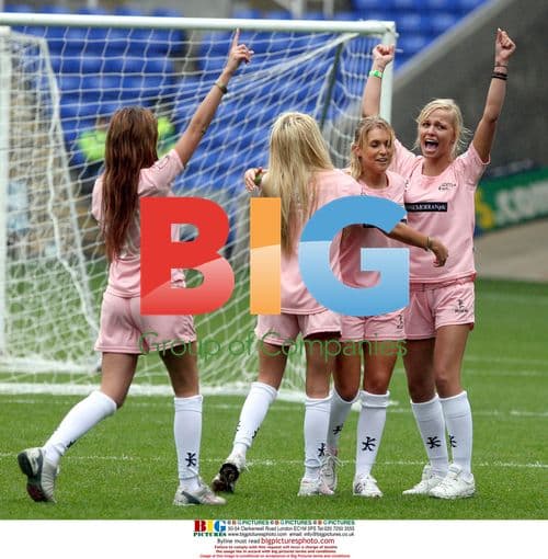 Page 3 girls celebrate goal at Soccer Six