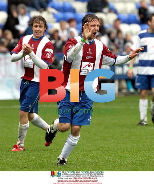 Harry Judd and Danny Jones celebrate goal
