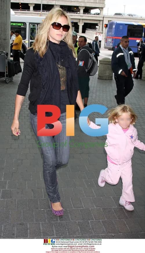 Seal kisses Heidi Klum goodbye at LAX
