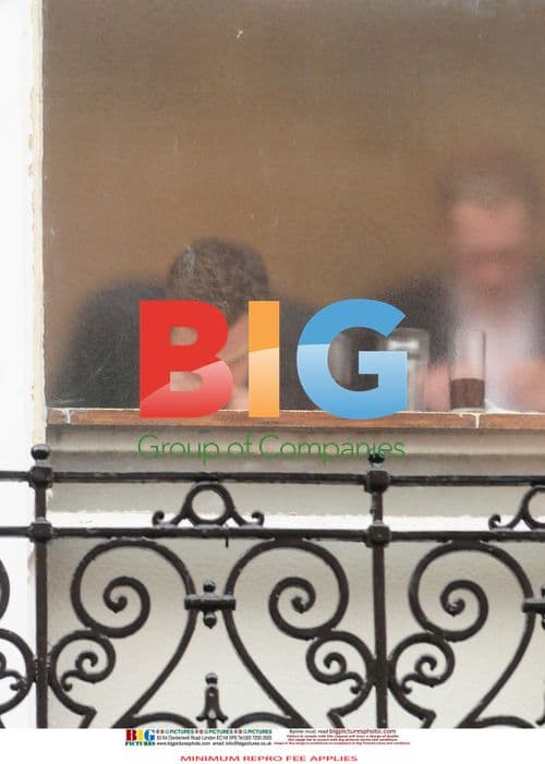 Men Appear to Take Drugs at Pub