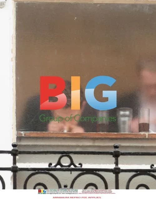 Men Appear to be Taking Drugs at Pub