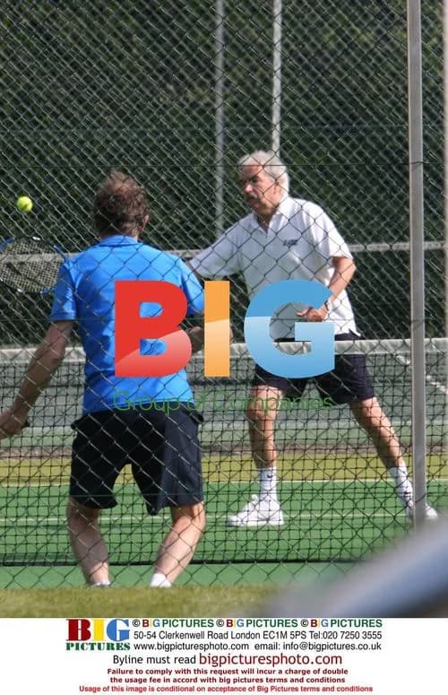 Des Lynam Playing Doubles Tennis