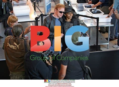 David Caruso and Liza Marquez depart LAX