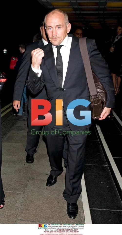 Barry McGuigan poses for cameras at London hotel