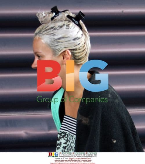 Lily Allen goes shopping for sunglasses in London