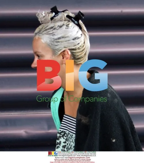 Lily Allen goes shopping for sunglasses in London