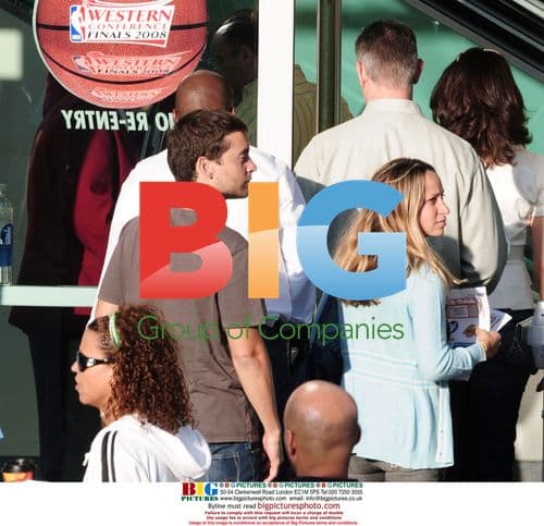 Tobey Maguire and Jennifer Meyer at LA Lakers Game