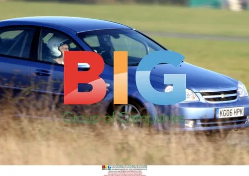 Michael Parkinson goes through tme motions with Stig on Top Gear