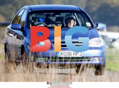 Michael Parkinson as "star in reasonably priced car"