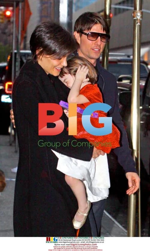 Tom Cruise, Katie Holmes, and daughter Suri exit NYC apartment