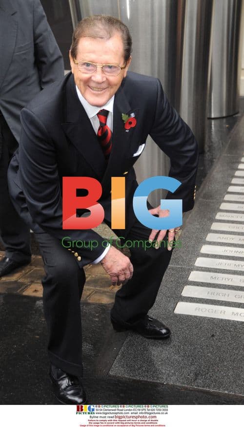 Roger Moore Awarded National Order of Arts and Letters