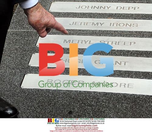 Roger Moore inaugurated as commander in France's National Order of Arts and Letters