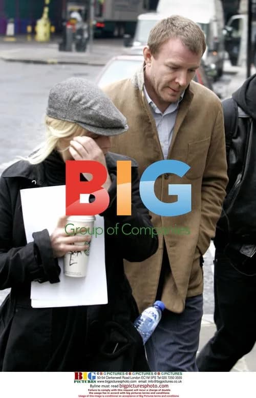 Guy Ritchie with mystery woman