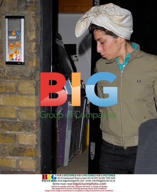 Amy Winehouse Leaving Home with Father