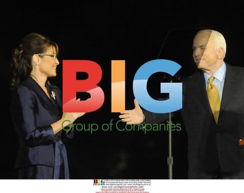 McCain Winks at Palin After Concession Speech