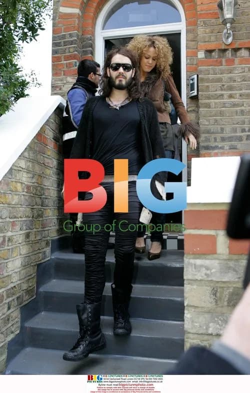 Russell Brand leaves home with girlfriend