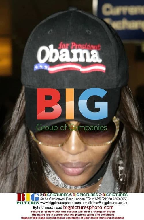 Naomi Campbell Arrives at Heathrow with Obama Support