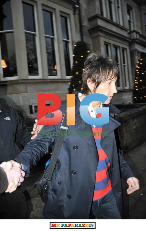 Noel Gallagher and Oasis Band Outside Glasgow Hotel