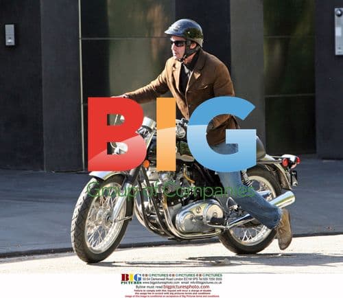 Keanu Reeves rides motorcycle in LA