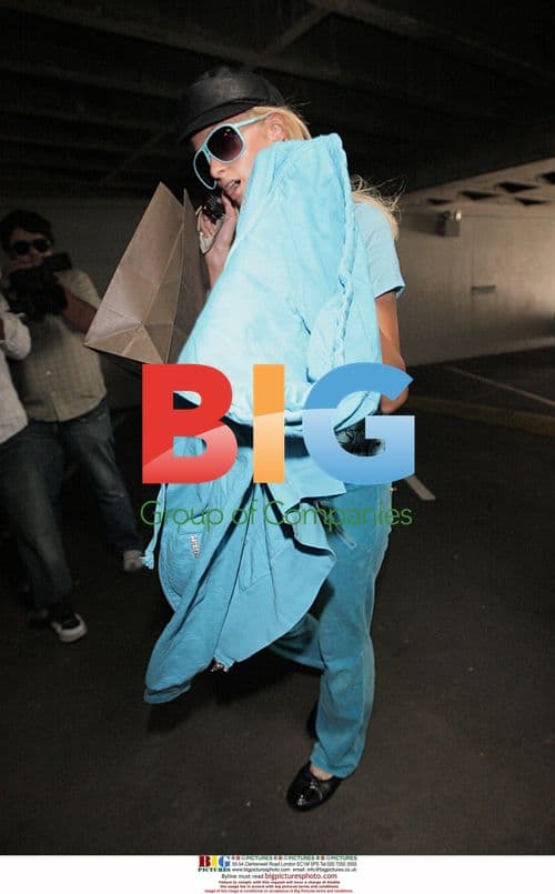 Paris Hilton Exits Salon