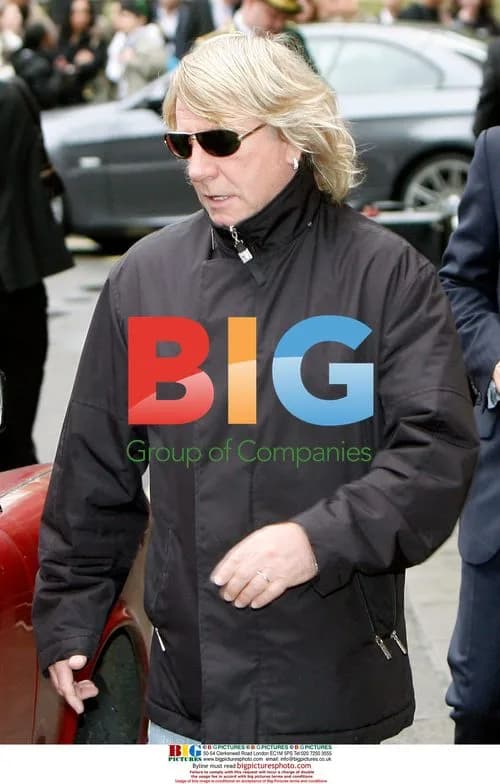 Status Quo guitarist Rick Parfitt and wife