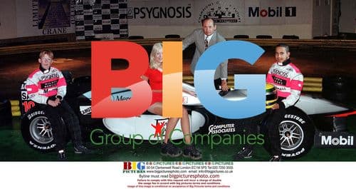 Lewis Hamilton poses with Page 3 Girl Katie Richmond