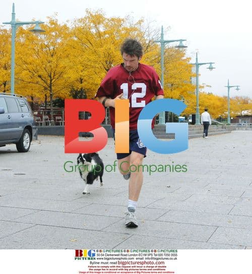 Ethan Hawk jogs with dog in NYC