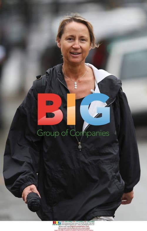 Carol McGiffin out in the rain, London