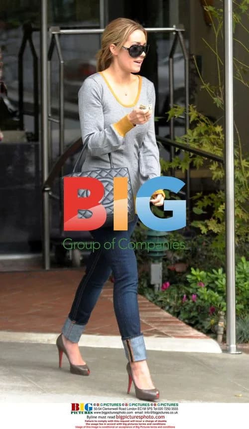 Lauren Conrad chats outside Sunset Marquis Hotel