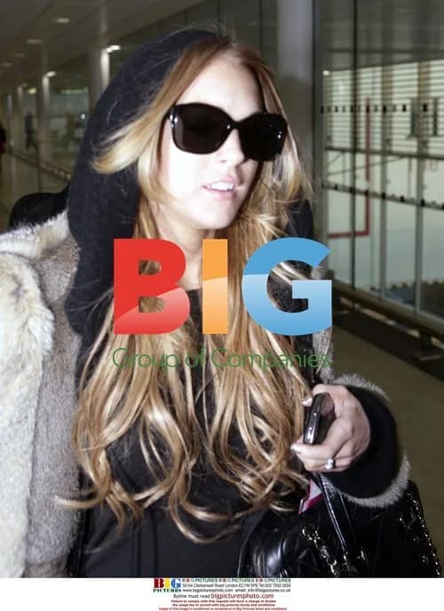 Lindsay Lohan and Samantha Ronson at Heathrow