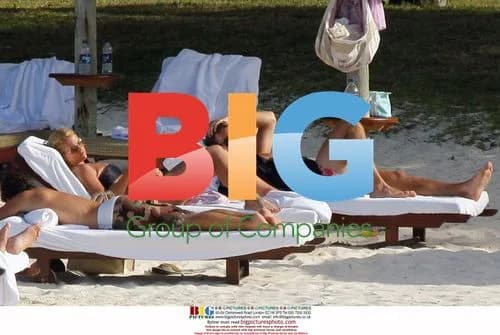 Princess Madeleine relaxes on beach
