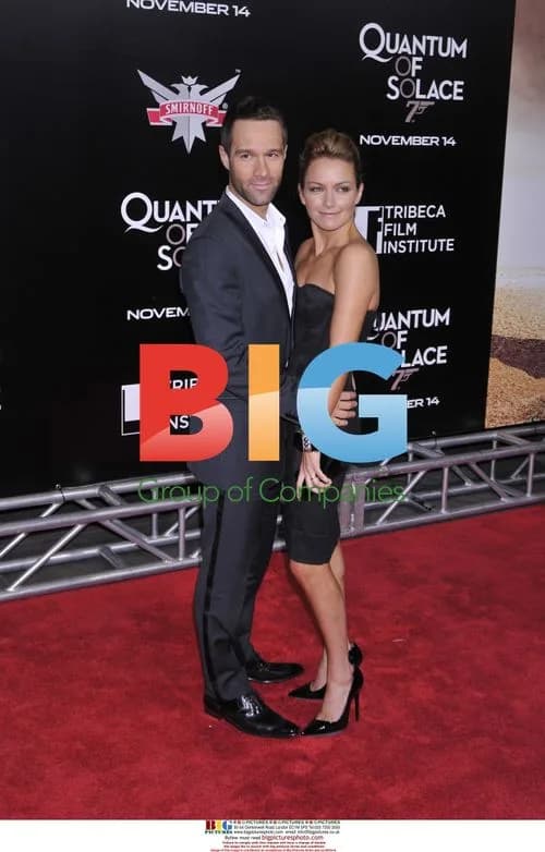 Chris Diamantopoulos and Becki Newton at 'Quantum of Solace' Premiere