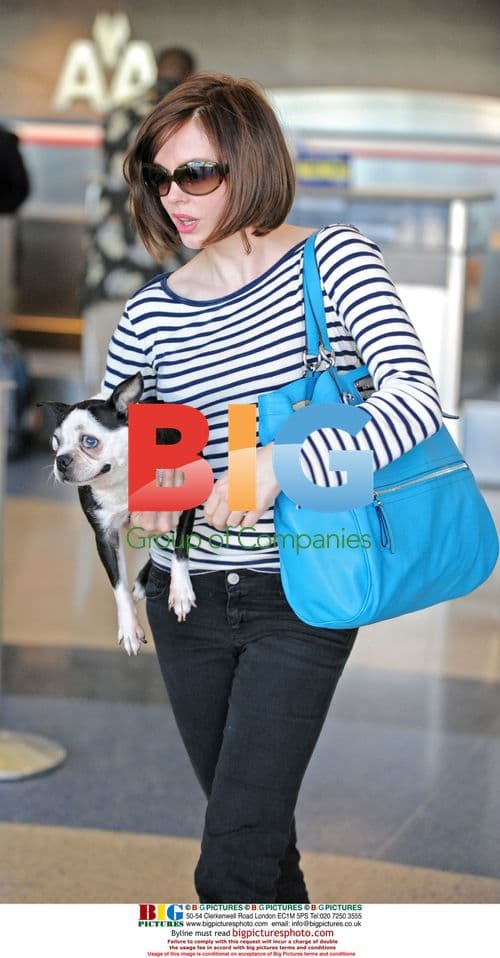 Rose McGowan with dog at LAX