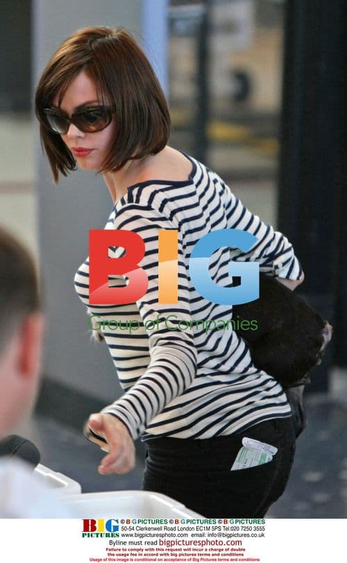 Rose McGowan at LAX with Dog