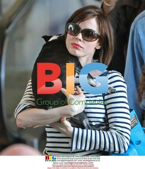 Rose McGowan with dog at LAX