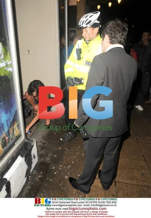 Two girls put on a show outside Movida