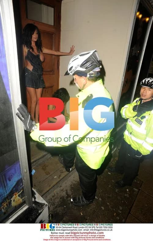Girls Give Onlookers Eyeful Outside Club