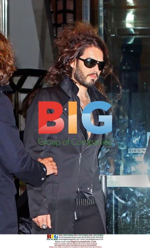 Russell Brand exits NYC hotel for comedy show