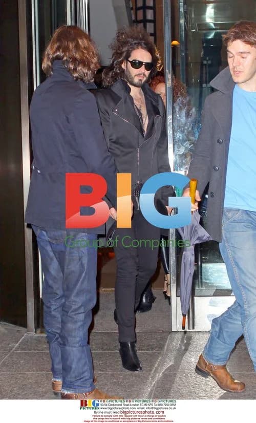 Russell Brand leaves NYC hotel for show