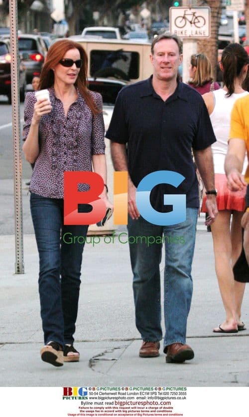 Tom Mahoney and Marcia Cross take a walk